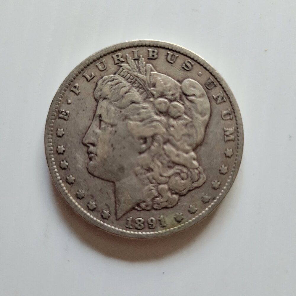 1891 o Morgan silver dollar
